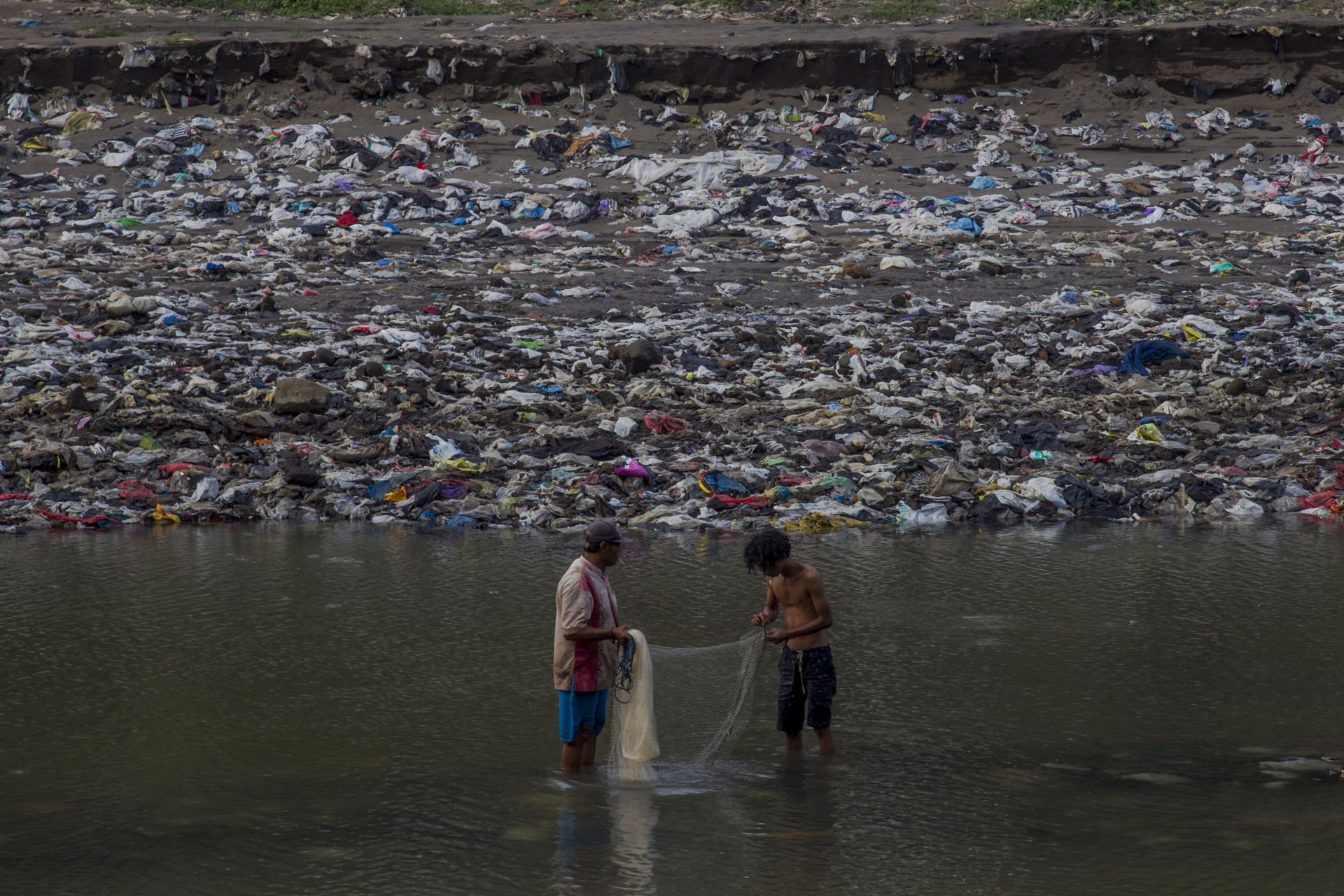 Fishing Amid Plastic Waste (Alaika Rahmatullah)